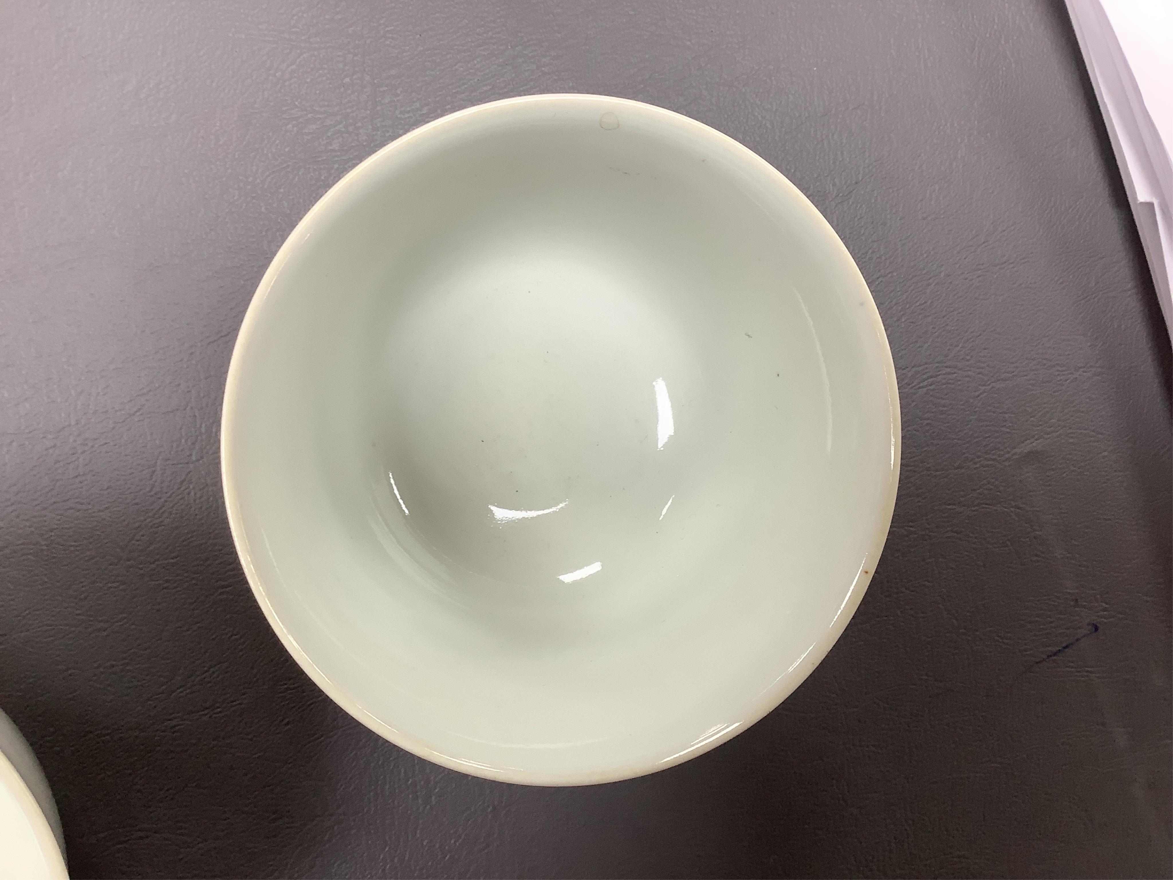 A pair of Chinese white glazed porcelain tea bowls, 6cm high